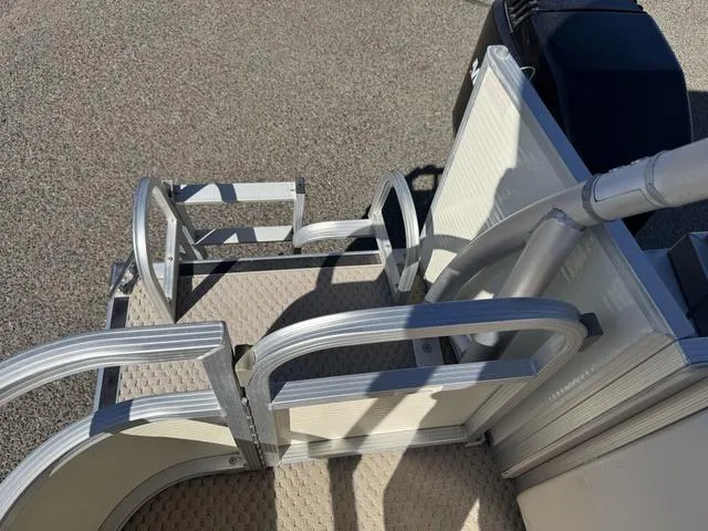 Slide: The Image of 2007 Bennington 2275 GL boat ladder and deck, featuring aluminum railings. - 46