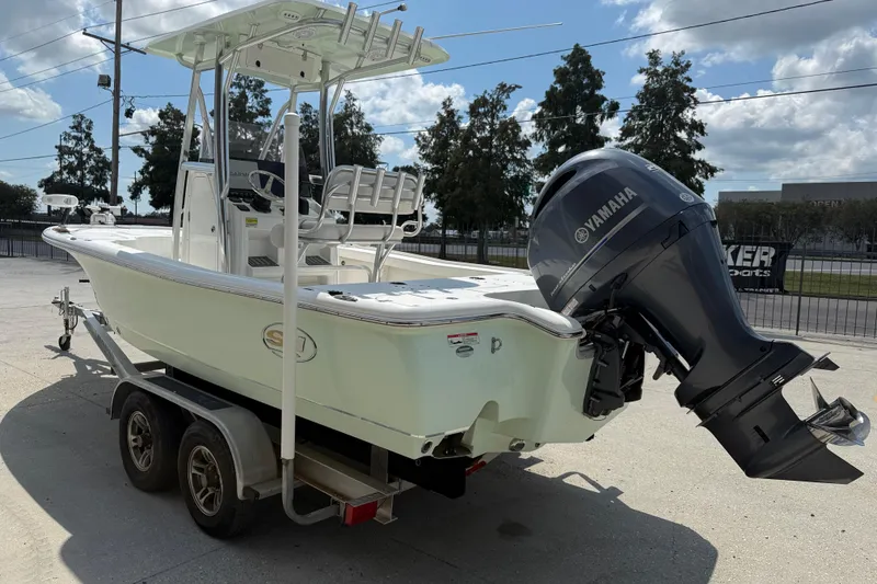 Slide: The Image of 2022 Sea Hunt BX 22 BR boat with Yamaha outboard motor on a trailer. - 4