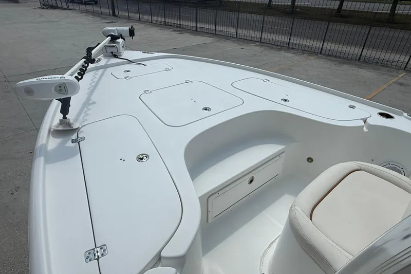 Slide: The Image of 2022 Sea Hunt BX 22 BR boat deck with storage compartments and seating. - 9