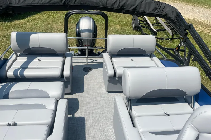 Slide: The Image of 2025 Bentley Pontoons Legacy QSB with luxurious seating and modern design. - 13