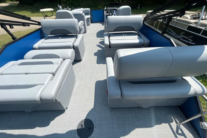 Slide: The Image of 2025 Bentley Pontoons Legacy QSB interior with luxurious gray seating and spacious layout. - 15