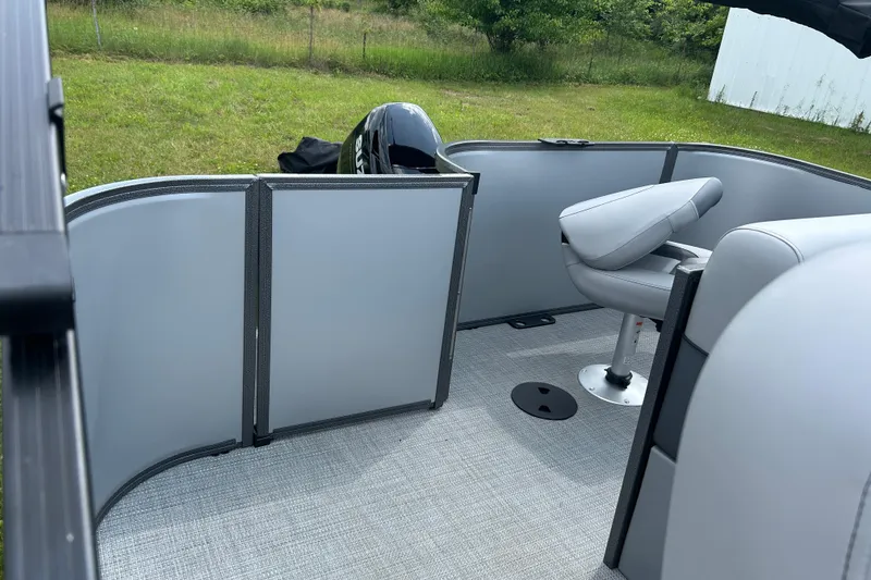 Slide: The Image of 2025 Bentley Pontoons LE 180 3PT interior with sleek seating and modern design. - 10