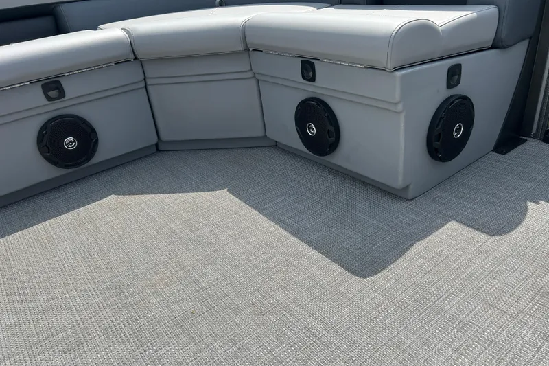 Slide: The Image of 2025 Bentley Pontoons LE 180 3PT interior seating with built-in speakers. - 18