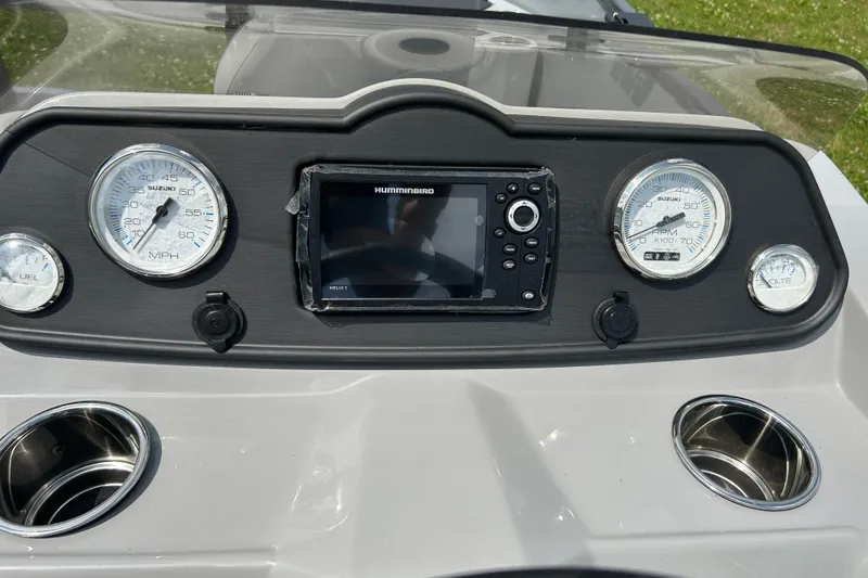 Slide: The Image of Dashboard of 2025 Bentley Pontoons LE 180 3PT with gauges and Humminbird display. - 22
