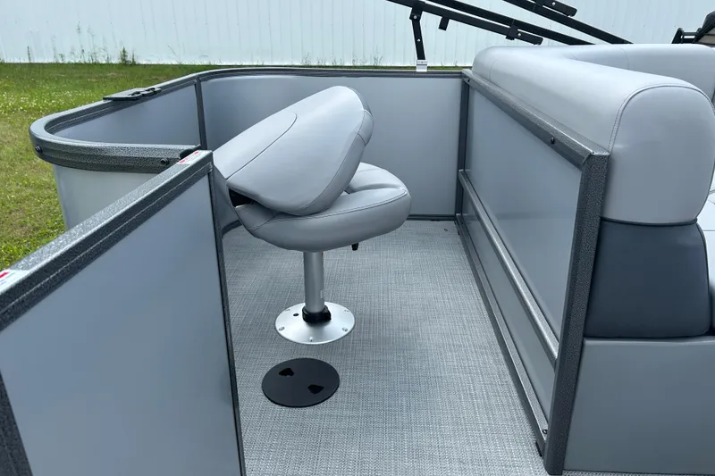 Slide: The Image of 2025 Bentley Pontoons LE 180 3PT interior with gray seating and flooring. - 9