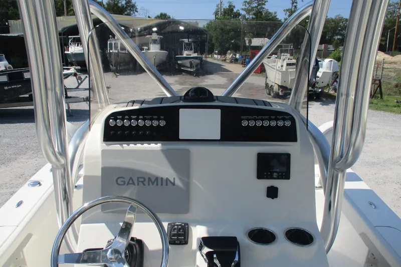 Slide: The Image of Cockpit view of 2026 Avenger AV26 boat with Garmin navigation system. - 20