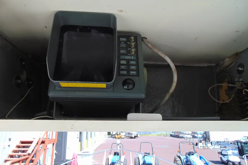 Slide: The Image of 1988 Sea Ray 270 Amberjack boat dashboard with vintage navigation equipment. - 15