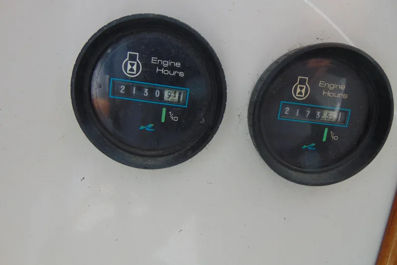 Slide: The Image of Close-up of engine hour meters on a 1988 Sea Ray 270 Amberjack boat. - 17