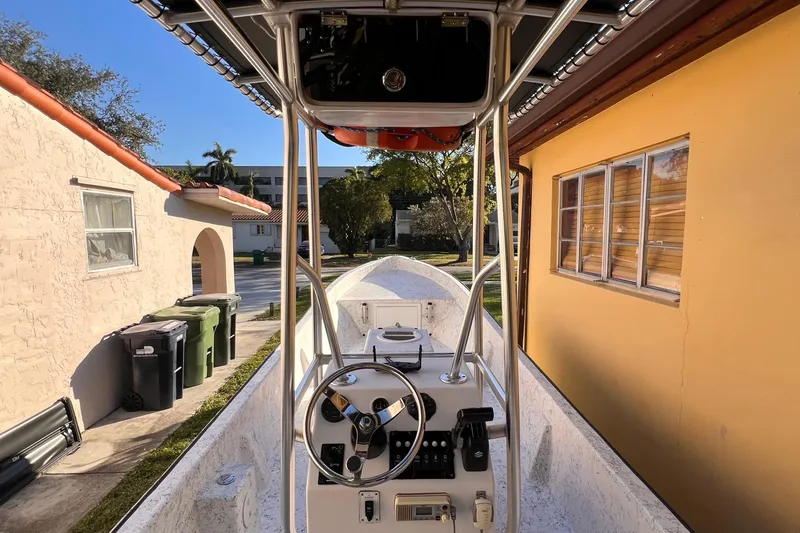 Slide: The Image of Outboard motor with Suzuki logo and "115" marking, Panga Minsa 2017 model. - 13