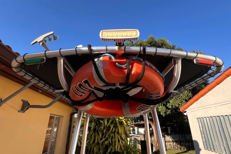 Slide: The Image of 2017 Panga Minsa boat interior with textured design, docked near buildings. - 16