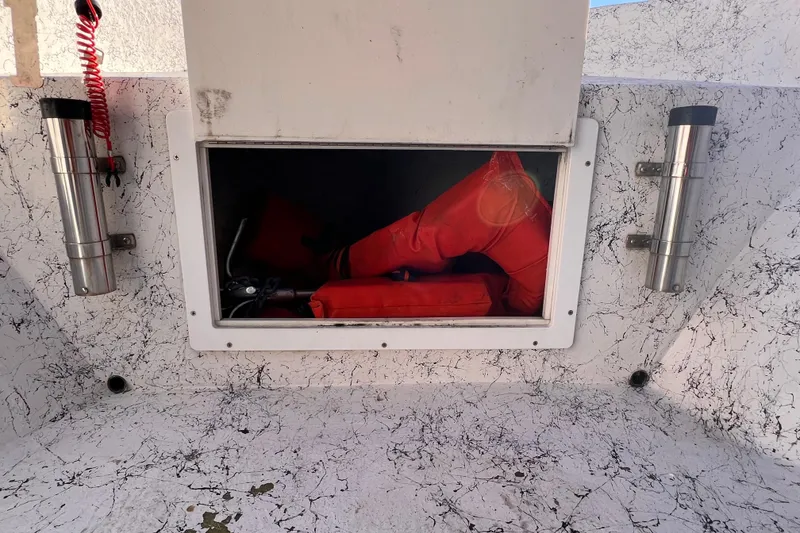 Slide: The Image of 2017 Panga Minsa boat interior with steering console and storage compartments. - 22