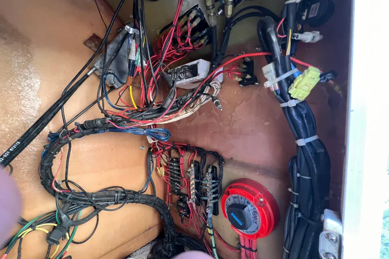 Slide: The Image of Electrical compartment of 2017 Panga Minsa boat with battery and wiring. - 24