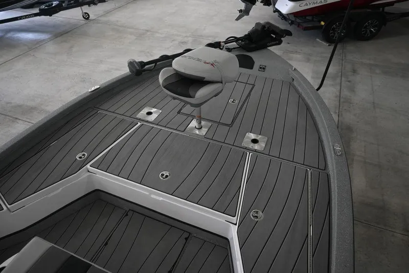 Slide: The Image of 2026 Vexus ACX 2210 boat deck with seating and storage compartments. - 10