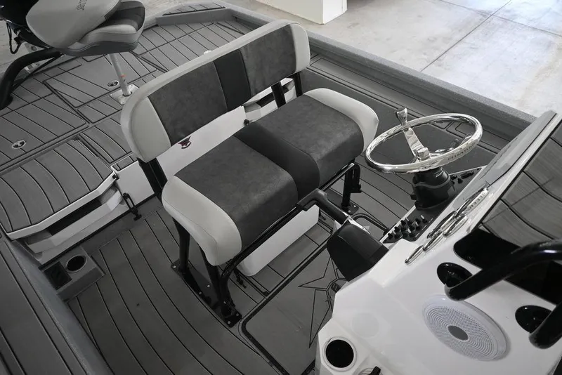 Slide: The Image of Interior of 2026 Vexus ACX 2210 boat with dual seats and steering wheel. - 16