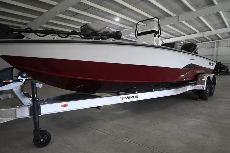 Slide: The Image of 2026 Vexus ACX 2210 boat on trailer in indoor storage facility. - 17