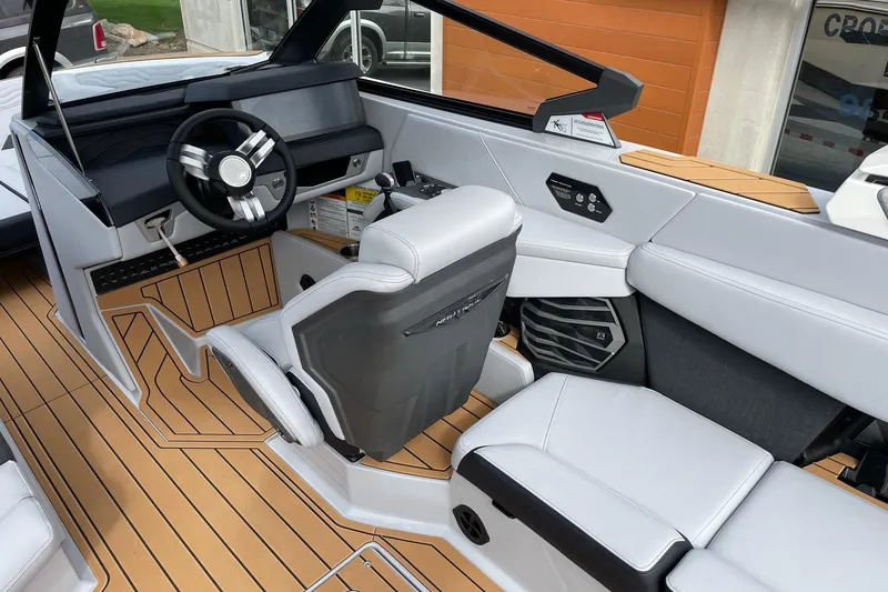 Slide: The Image of 2026 Nautique Super Air Nautique G25 interior with sleek design and modern controls. - 6