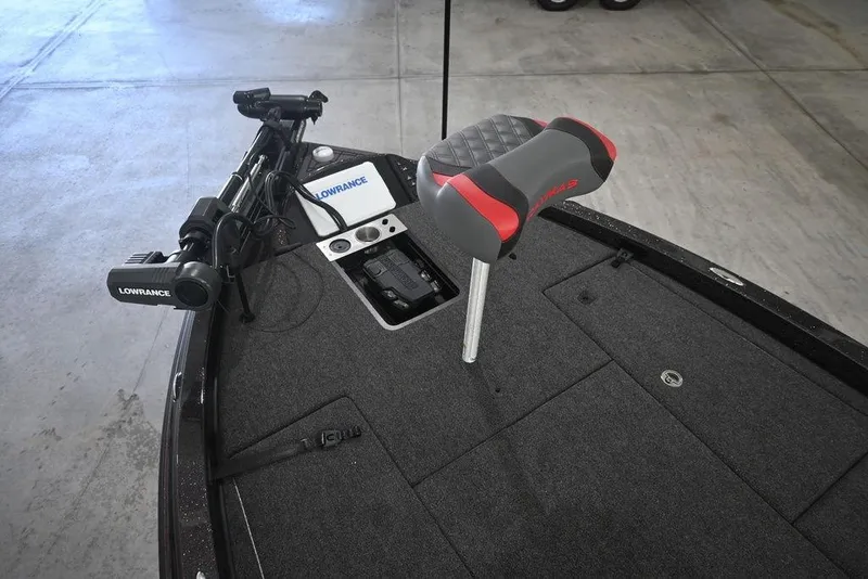 Slide: The Image of 2026 Caymas CX20 PRO boat deck with Lowrance equipment and cushioned seat. - 6