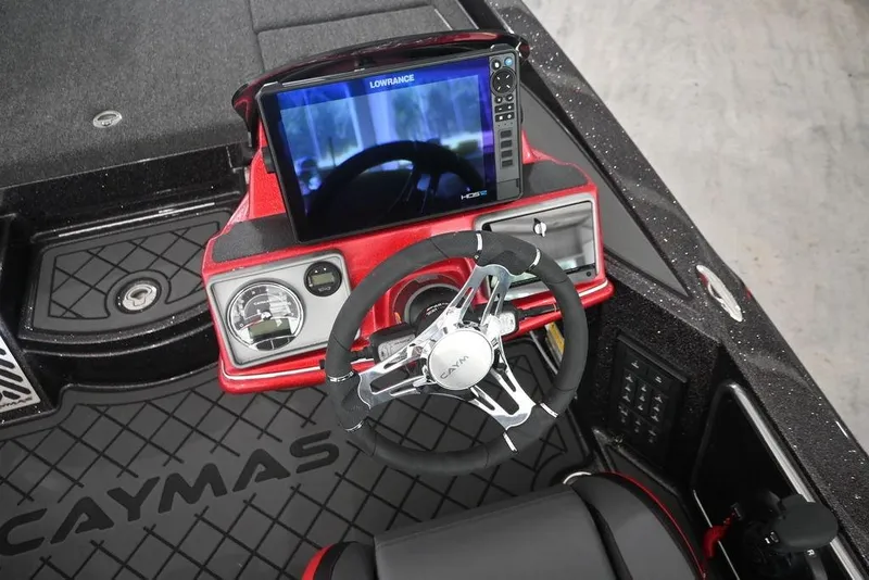 Slide: The Image of 2026 Caymas CX20 PRO boat dashboard with steering wheel and digital display. - 8
