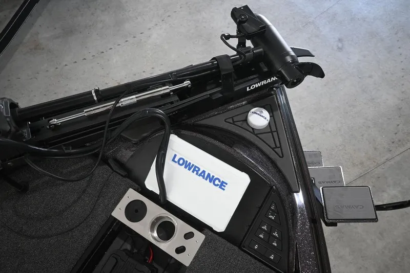 Slide: The Image of 2026 Caymas CX20 PRO boat with Lowrance electronics and foot pedals. - 9