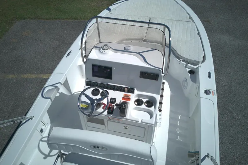 Slide: The Image of 2017 Sea Hunt BX 22 BR boat interior with steering console and seating. - 5