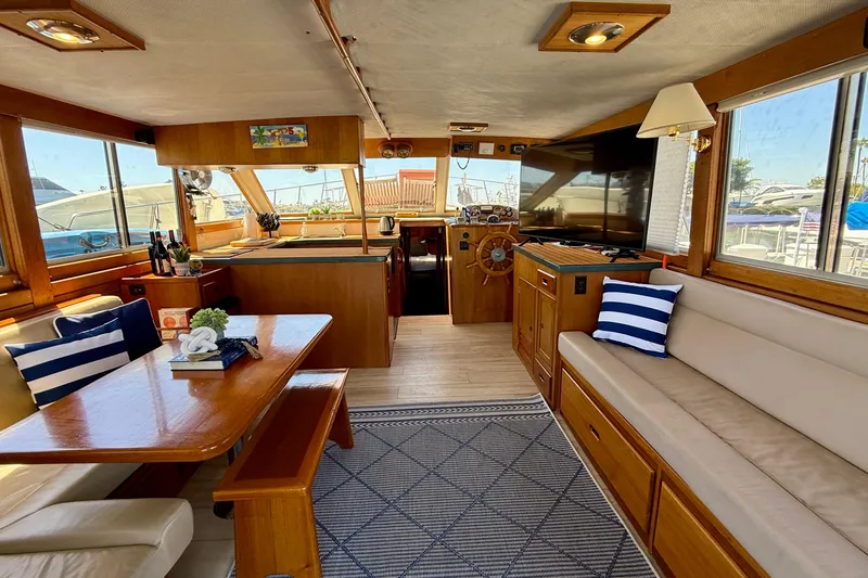 Slide: The Image of Luxurious 1991 Kong & Halvorsen Island Gypsy yacht interior with elegant wood finishes and nautical decor. - 3