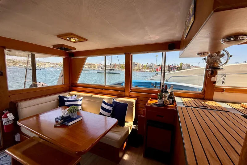 Slide: The Image of Interior of 1991 Kong & Halvorsen Island Gypsy yacht with scenic marina view. - 7