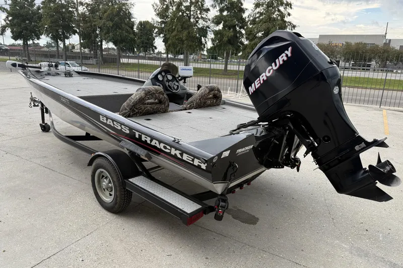 Slide: The Image of 2011 Bass Tracker PRO TEAM 190 TX boat with Mercury engine on trailer. - 5