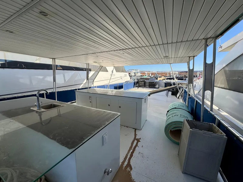 Slide: The Image of 2013 Bravada Bella Luna Share #8 yacht deck with sink and storage. - 25