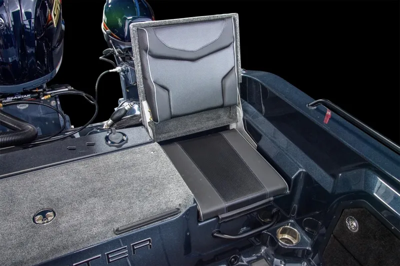Slide: The Image of Manufacturer Provided Image: Skeeter WXR2060 F 2026 boat interior with open storage compartment and seating. - 12