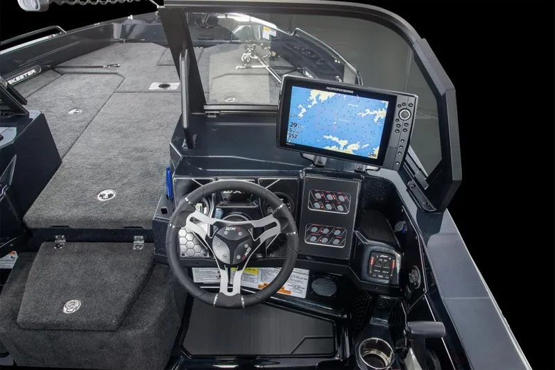 Slide: The Image of Manufacturer Provided Image: 2026 Skeeter WXR2060 F boat cockpit with navigation system and steering wheel. - 8