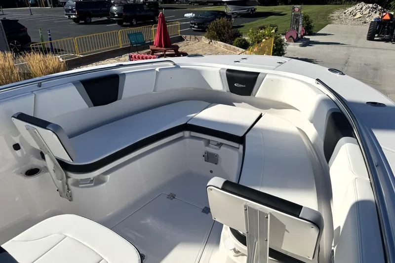 Slide: The Image of 2025 Robalo R270 Center Console boat interior with white seating and modern design. - 10