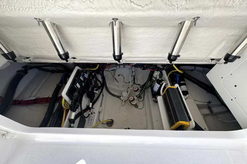 Slide: The Image of 2025 Robalo R270 Center Console boat interior wiring and components view. - 21