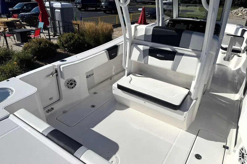 Slide: The Image of 2025 Robalo R270 Center Console boat interior with seating and storage compartments. - 33