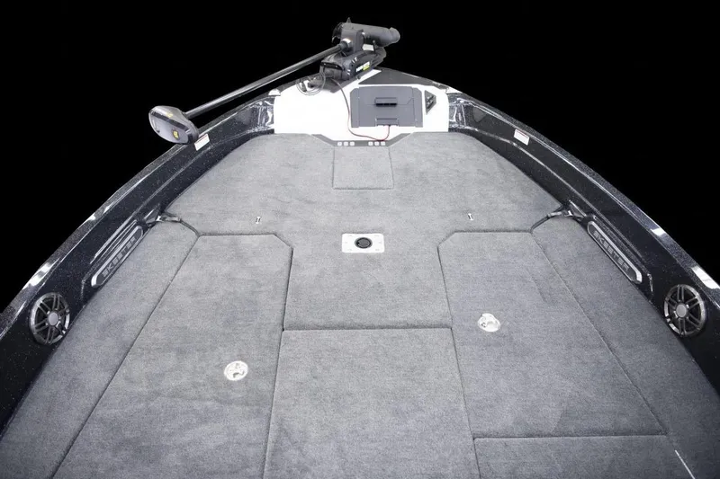 Slide: The Image of 2026 Skeeter WXR2260 boat interior with dual motors and cushioned seating. - 2