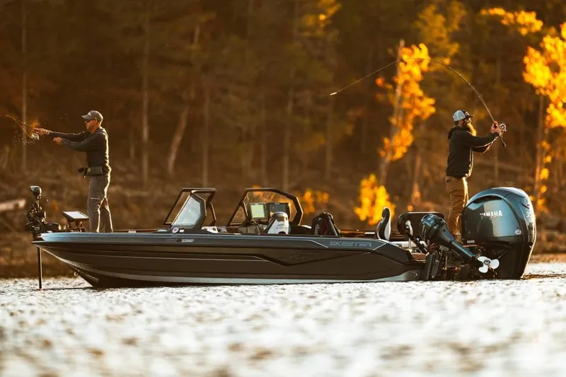 Slide: The Image of 2026 Skeeter WXR2260 boat cockpit with Garmin navigation system and steering wheel. - 7