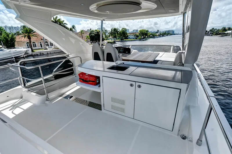 Slide: The Image of Luxury yacht Absolute 52 FLY 2025 with sleek deck and modern amenities. - 25