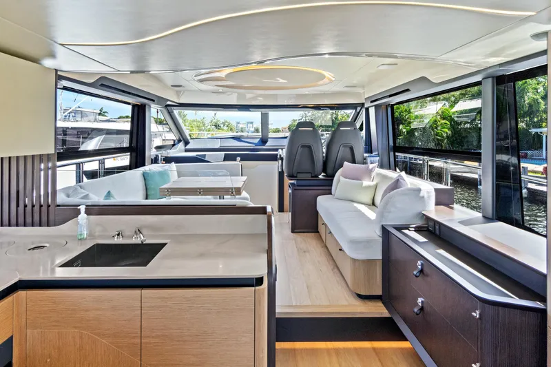 Slide: The Image of Luxurious interior of 2025 Absolute 52 FLY yacht with modern design and spacious seating. - 32