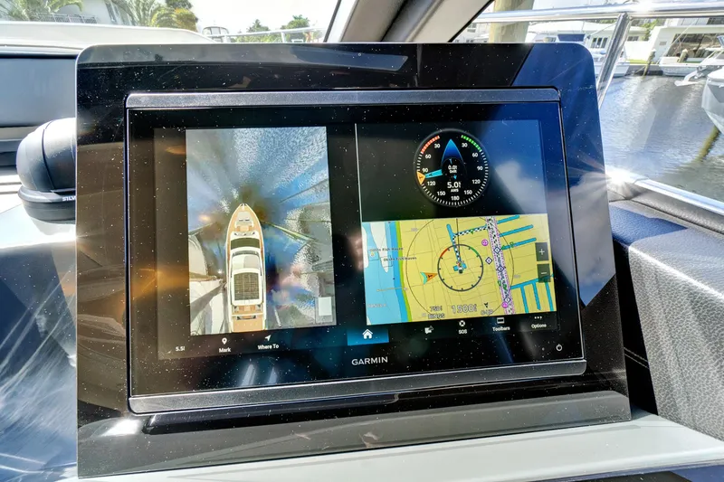 Slide: The Image of Garmin navigation display on 2025 Absolute 52 FLY yacht, showing maps and boat controls. - 48