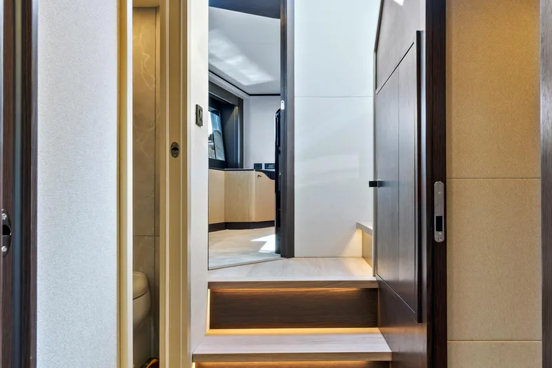 Slide: The Image of Interior of 2025 Absolute 52 FLY yacht, featuring modern design and elegant lighting. - 59