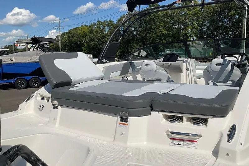 Slide: The Image of 2026 Chaparral 23 SSi OB boat interior with cushioned seating and modern design. - 13