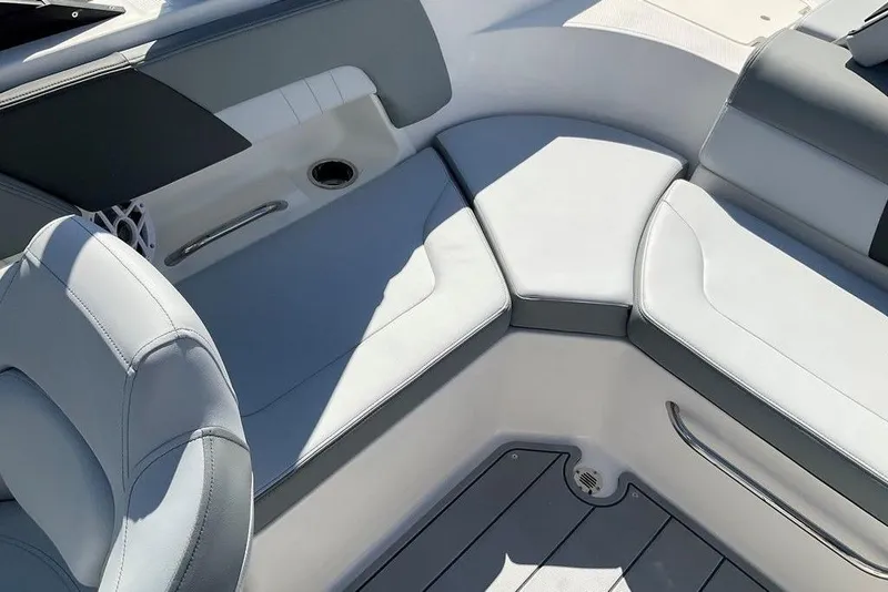 Slide: The Image of Interior seating of 2026 Chaparral 23 SSi OB boat, featuring sleek, modern design. - 22