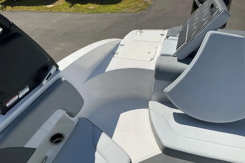 Slide: The Image of 2026 Chaparral 23 SSi OB boat interior with sleek seating and modern design. - 28
