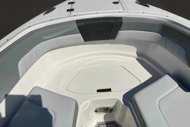 Slide: The Image of 2026 Chaparral 23 SSi OB boat interior with gray and white seating. - 37