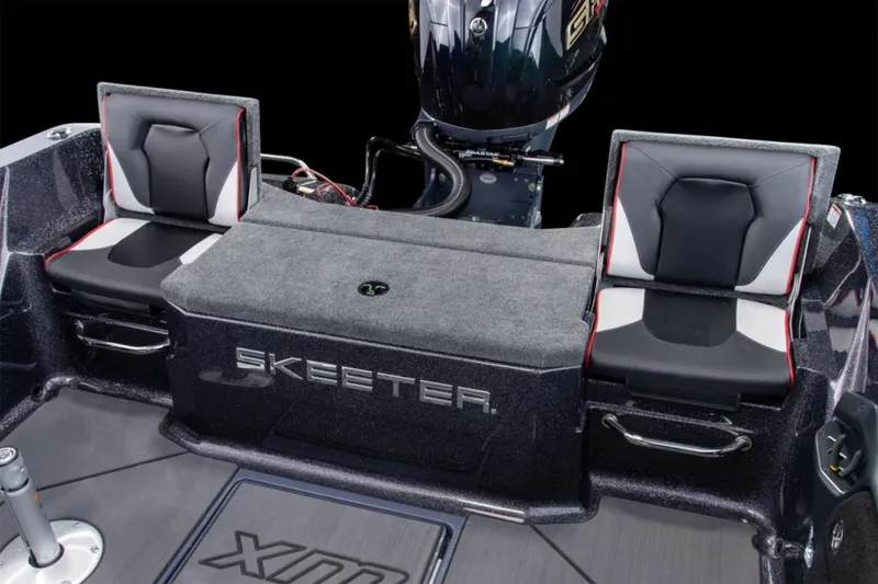 Slide: The Image of Manufacturer Provided Image: 2026 Skeeter WX1910 boat livewell with open lid, showcasing interior design. - 7
