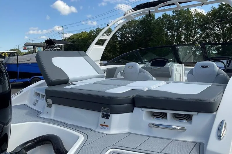 Slide: The Image of 2026 Chaparral 21 SSi OB boat with sleek seating and modern design. - 22