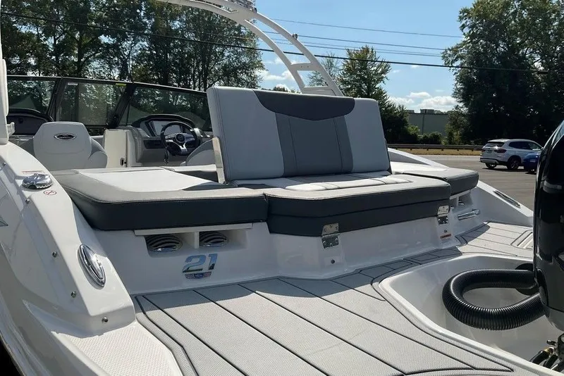 Slide: The Image of 2026 Chaparral 21 SSi OB boat with sleek seating and modern design. - 23