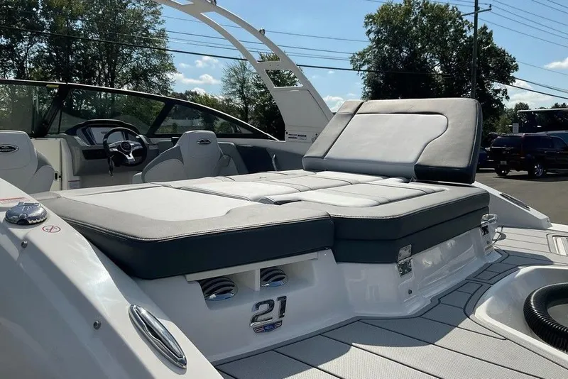Slide: The Image of 2026 Chaparral 21 SSi OB boat with sleek seating and modern design. - 25