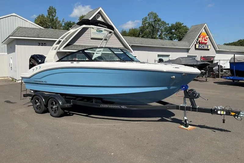 Slide: The Image of 2026 Chaparral 21 SSi OB boat on trailer at A&S Boats dealership. - 32