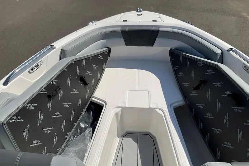 Slide: The Image of 2026 Chaparral 21 SSi OB boat interior with open storage compartments. - 7
