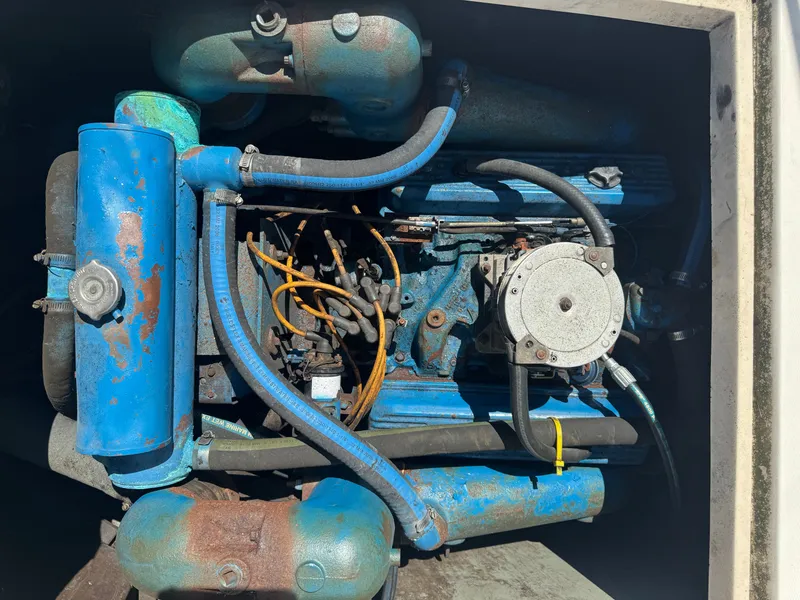 Slide: The Image of Engine compartment of a 1987 Phoenix 29 Convertible boat. - 10